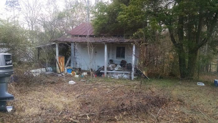 This abandoned and trashed 2 room house, probably built in the mid 1940's, was the home of Mr. Oscar 
