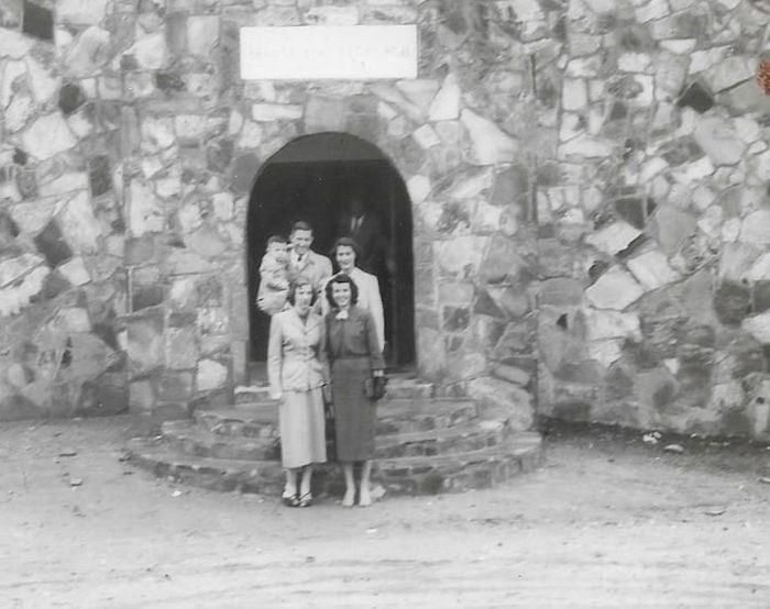 Edward Hall holding his first son, Mikeal, and his wife Nita Flurry Hall on the back row.  Beth Hall Duncan and Christine Griffith Buie are on the front row on the steps of Refuge Church , around 1951.  Edward and Nita went on to be missionaries in Liberia, West Africa.  Beth and her husband, Bill Duncan, went on to become missionaries in Borneo.  In fact, Bill died in Borneo while on a return visit.  Ed And Bill died in 2014.  Mikeal died in a tragic construction accident in 2010.  Beth died in 2016 in Arizona.  Nita continues to live in this area and Christine lives in north Georgia.