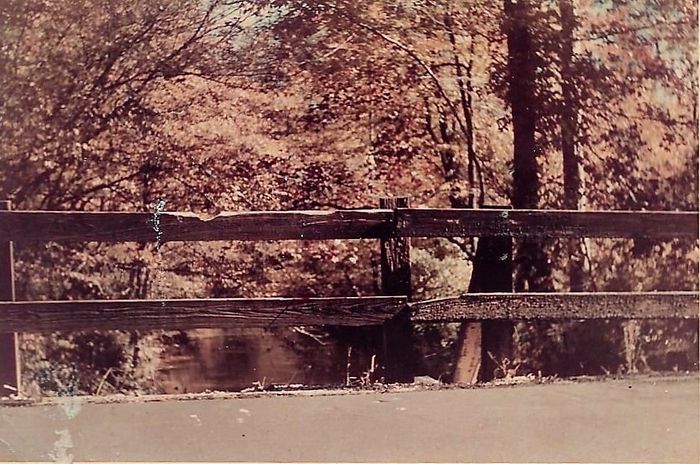 This pic shows the old wooden railing on the old bridge over the Channahatchee Creek, not many years after the road from Red Hill to Kent was finally paved. It was located just down the hill from the Walter Lloyd home, where Lloyd Road ends at the creek today. This was a spooky place after dark.  Many reports of an apparition of a woman, clothed only in a burlap bag, walking through the night, on or near the bridge, were given by people who happened to pass this way late at night.  This bridge was destroyed when the road was rerouted to the new AL 229 bridge just east of this area.