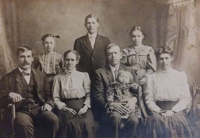 This impressive family photo is of the Taylor-Strength family, probably early in the last century.  On the back row are Ella Taylor, William Wesley 