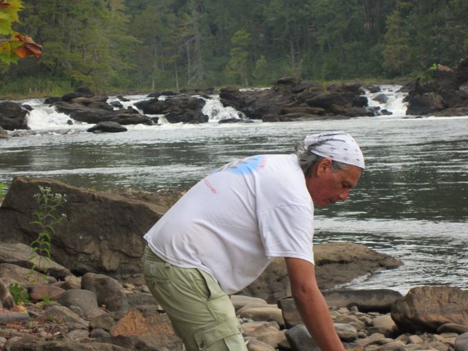 Jay gathering rocks from the Tallapoosa River -at the falls-for the Tuckabatchee Monument